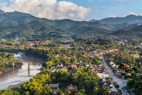 Luang Prabang tourism 2025, Laos travel, top holiday destinations Asia, UNESCO World Heritage, Kuang Si Falls, visit Luang Prabang, Smart Travel Asia