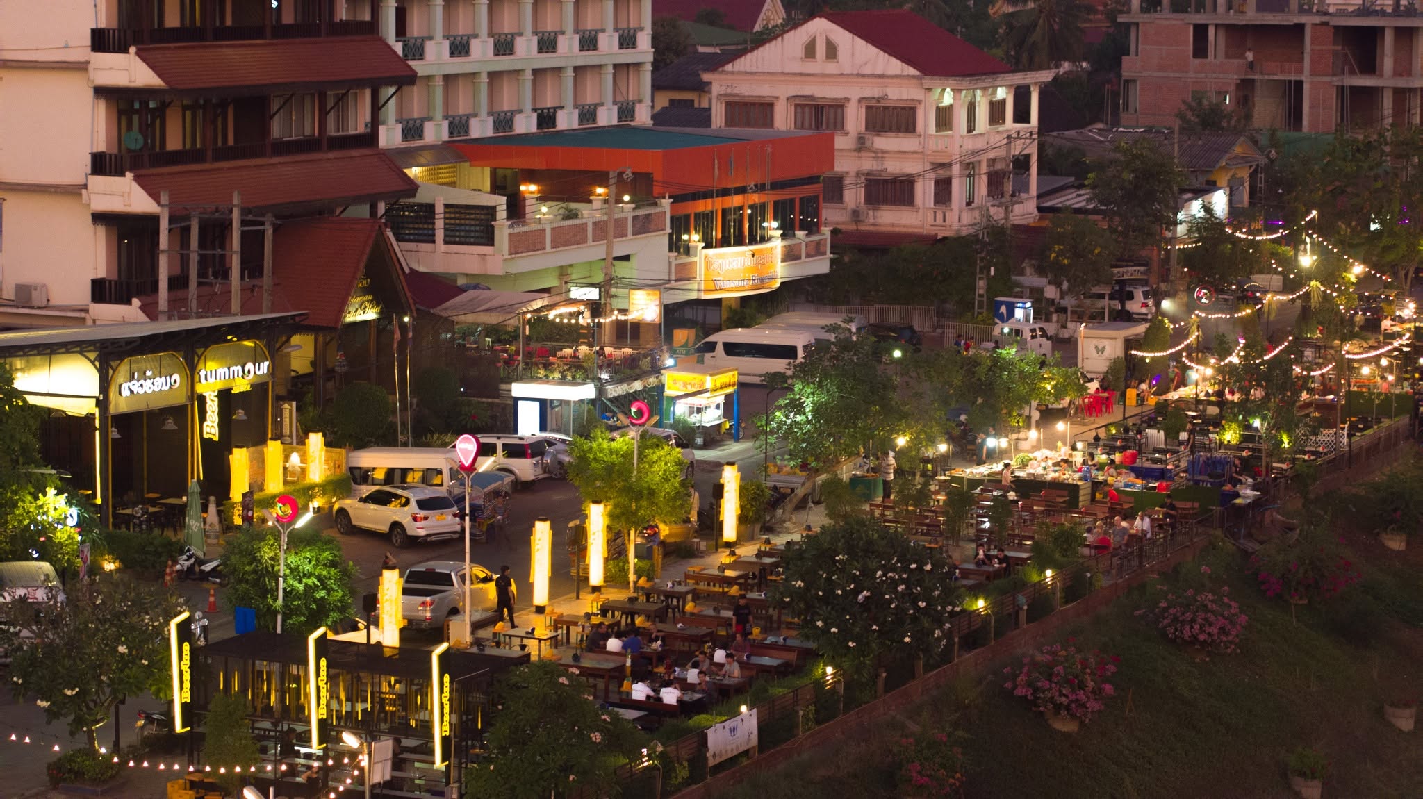 Vientiane, Laos: A Three-Day Pause in the Universe 4 Tummour restaurant lit up at night along the Mekong riverfront promenade in Vientiane